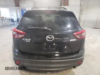 2016 Mazda CX-5 Grand Touring with VIN JM3KE4DY6G0655802, listed as a Copart auction lot 43820475 with 76,639 mi miles and Salvage Title. Bid and sale history available at carsss.com. Image 6.