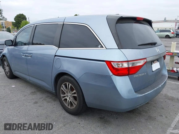 2012 Honda Odyssey EX-L with VIN 5FNRL5H66CB061847, listed as a IAAI auction lot 42162377 with 217,204 mi miles and . Bid and sale history available at DreamBid. Image 3.