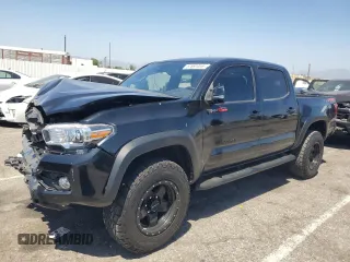 2018 Toyota Tacoma SR with VIN 3TMCZ5AN5JM148783, listed as a Copart auction lot 57691055 with 71,469 mi miles and Salvage title. Bid and sale history available at DreamBid. Image 1.