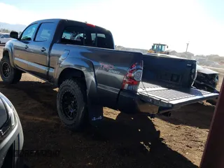 2011 Toyota Tacoma with VIN 3TMMU4FN0BM032561, listed as a IAAI auction lot 41190472 with 188,862 mi miles and . Bid and sale history available at DreamBid. Image 3.