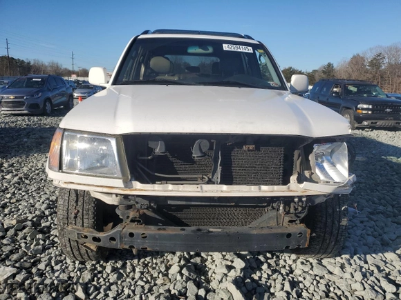 2003 Toyota Land Cruiser with VIN JTEHT05J332047006, listed as a Copart auction lot 42594145 with 258,623 mi miles and Salvage Title. Bid and sale history available at carsss.com. Image 5.