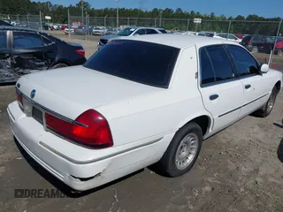 2000 Mercury Grand Marquis LS z VIN 2MEFM75W3YX689323, wystawiony jako IAAI lot #42019687 z przebiegiem 241 045 mil mil oraz . Historia ofert i sprzedaży dostępna na DreamBid. Obrazek 4.