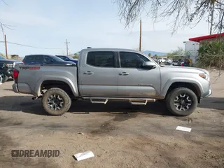 2020 Toyota Tacoma SR5 with VIN 3TMCZ5AN1LM324828, listed as a IAAI auction lot 40977362 with 33,906 mi miles and . Bid and sale history available at DreamBid. Image 13.