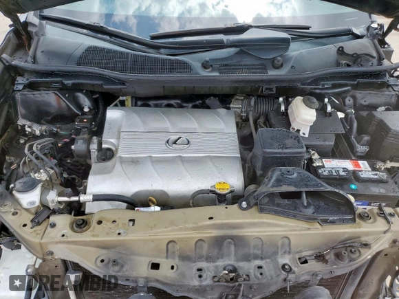 2015 Lexus RX 350 z VIN 2T2ZK1BAXFC153945, wystawiony jako Copart lot #57992875 z przebiegiem 122 099 mil mil oraz Szkoda całkowita • Salvage title. Historia ofert i sprzedaży dostępna na DreamBid. Obrazek 12.
