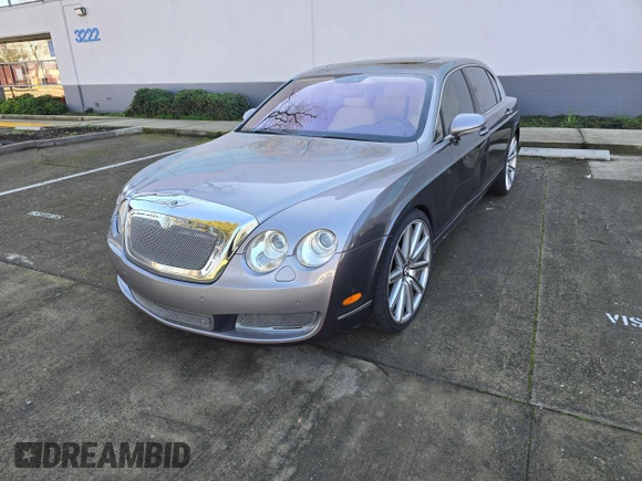 2006 Bentley Flying Spur with VIN SCBBR53W66C034319, listed as a Copart auction lot 87561075 with 85,166 mi miles and Salvage title. Bid and sale history available at DreamBid. Image 2.