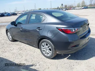 2016 Scion iA with VIN 3MYDLBZV3GY131783, listed as a IAAI auction lot 41999144 with 197,827 mi miles. Bid and sale history available at carsss.com. Image 3.