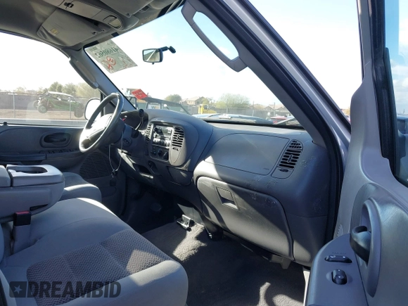 2003 Ford F-150 XLT with VIN 1FTRW08LX3KC79700, listed as a IAAI auction lot 41680562 with 131,052 mi miles. Bid and sale history available at carsss.com. Image 5.