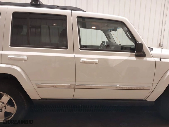 2010 Jeep Commander Sport with VIN 1J4RG4GK7AC132121, listed as a IAAI auction lot 41187854 with 155,413 mi miles. Bid and sale history available at carsss.com. Image 14.
