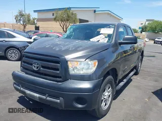 2013 Toyota Tundra z VIN 5TFRM5F15DX053654, wystawiony jako IAAI lot #42324593 z przebiegiem 128 206 mil mil oraz . Historia ofert i sprzedaży dostępna na DreamBid. Obrazek 2.