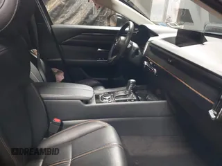 2023 Mazda CX-50 S Premium Plus with VIN 7MMVABEM3PN108555, listed as a IAAI auction lot 41202257 with 21,258 mi miles and . Bid and sale history available at DreamBid. Image 5.
