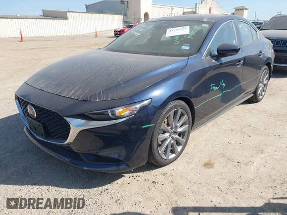 2025 Mazda 3 S Preferred with VIN 3MZBPACM9SM454771, listed as a IAAI auction lot 41997209 with 3,748 mi miles and . Bid and sale history available at DreamBid. Image 2.