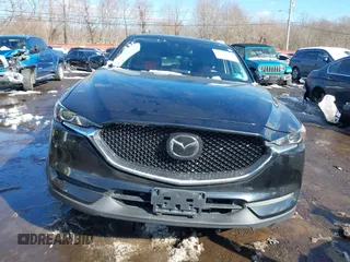 2018 Mazda CX-5 Touring with VIN JM3KFBCM2J0451828, listed as a IAAI auction lot 41531728 with 88,939 mi miles. Bid and sale history available at carsss.com. Image 12.