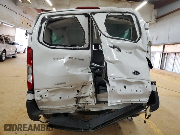 2023 Ford Transit Passenger XL z VIN 1FBAX2YGXPKB08481, wystawiony jako Copart lot #43177325 z przebiegiem Nie podano mil oraz Szkoda całkowita • Salvage title. Historia ofert i sprzedaży dostępna na DreamBid. Obrazek 6.