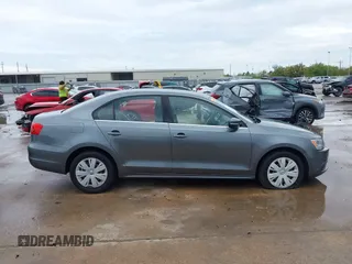 2013 Volkswagen Jetta SE with VIN 3VWDX7AJ9DM371414, listed as a IAAI auction lot 41861196 with 156,169 mi miles and . Bid and sale history available at DreamBid. Image 14.