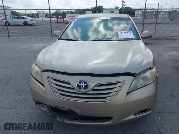 2007 Toyota Camry CE with VIN 4T1BE46K27U601466, listed as a IAAI auction lot 42169294 with 236,537 mi miles. Bid and sale history available at carsss.com. Image 6.