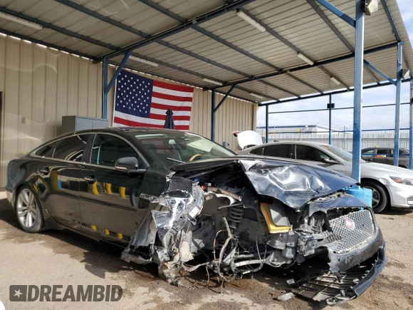 2014 Jaguar XJ with VIN SAJWA1CZ2E8V69885, listed as a Copart auction lot 53163105 with 117,793 mi miles and Clean Title. Bid and sale history available at DreamBid. Image 4.