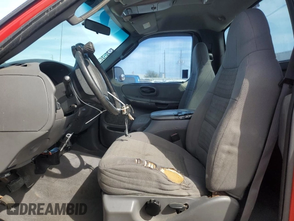 2003 Ford F-150 XL with VIN 1FTRF18W53NA99930, listed as a Copart auction lot 49046965 with 139,433 mi miles and Salvage title. Bid and sale history available at DreamBid. Image 7.