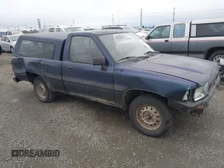 1991 Toyota Pickup z VIN JT4RN81A5M0073966, wystawiony jako IAAI lot #41828195 z przebiegiem 183 415 mil mil oraz . Historia ofert i sprzedaży dostępna na DreamBid. Obrazek 1.