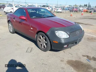 1999 Mercedes-Benz SLK 230/320 with VIN WDBKK47F5XF112125, listed as a IAAI auction lot 42207615 with 93,962 mi miles and . Bid and sale history available at DreamBid. Image 1.