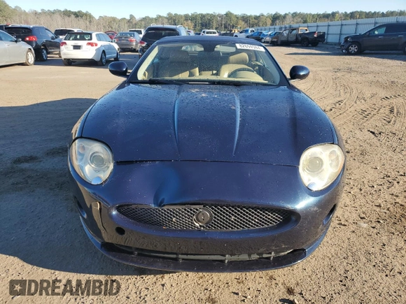 2007 Jaguar XK with VIN SAJDA44B075B06208, listed as a Copart auction lot 82694984 with 74,003 mi miles and Salvage Title. Bid and sale history available at carsss.com. Image 5.