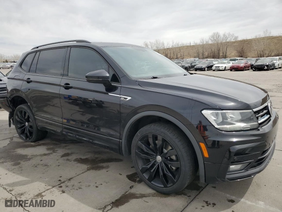 2020 Volkswagen Tiguan SE with VIN 3VV2B7AX8LM114368, listed as a Copart auction lot 50949875 with 69,046 mi miles and Salvage Title. Bid and sale history available at carsss.com. Image 4.