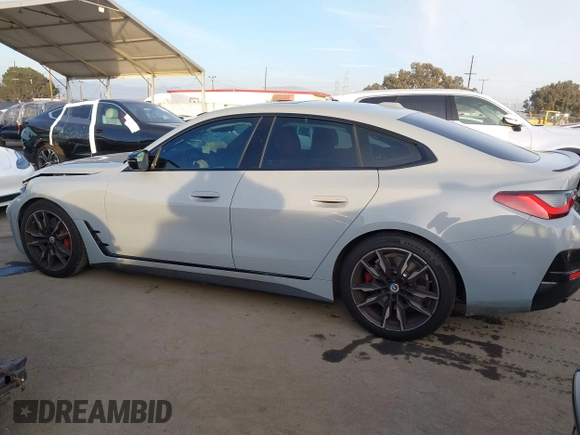 2023 BMW 4 Series M440i with VIN WBA63AW02PFN40551, listed as a IAAI auction lot 41230910 with 23,526 mi miles and . Bid and sale history available at DreamBid. Image 14.