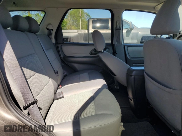 2006 Ford Escape XLT с VIN 1FMCU93106KC50549, выставлен на аукционе Copart как лот 54784475 с пробегом 158 211 миль миль и Списание • Salvage title. История ставок и продаж доступна на DreamBid. Изображение 11.