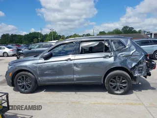 2023 Volkswagen Tiguan SE z VIN 3VVNB7AX5PM064693, wystawiony jako IAAI lot #42033011 z przebiegiem 38 220 mil mil oraz . Historia ofert i sprzedaży dostępna na DreamBid. Obrazek 14.
