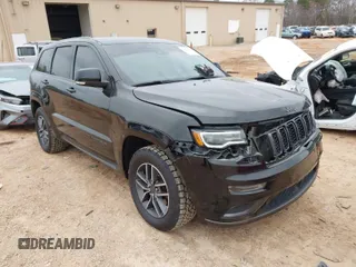2018 Jeep Grand Cherokee High Altitude with VIN 1C4RJFCT5JC283704, listed as a IAAI auction lot 41613275 with 134,134 mi miles. Bid and sale history available at carsss.com. Image 1.