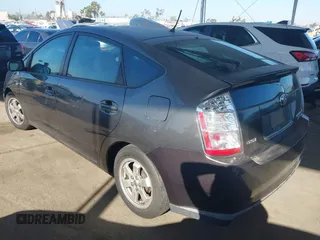 2007 Toyota Prius z VIN JTDKB20U873226409, wystawiony jako IAAI lot #42541909 z przebiegiem 128 374 mil mil oraz . Historia ofert i sprzedaży dostępna na DreamBid. Obrazek 3.