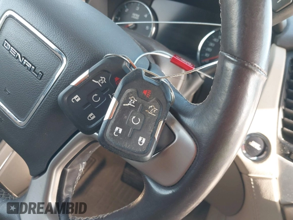 2020 GMC Yukon XL Denali with VIN 1GKS1HKJ6LR282854, listed as a IAAI auction lot 41717072 with 56,715 mi miles and . Bid and sale history available at DreamBid. Image 11.