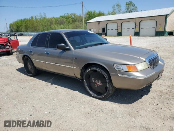 2001 Mercury Grand Marquis LS z VIN 2MEFM75W11X612617, wystawiony jako Copart lot #54782295 z przebiegiem 171 944 mil mil oraz Szkoda całkowita • Salvage title. Historia ofert i sprzedaży dostępna na DreamBid. Obrazek 4.