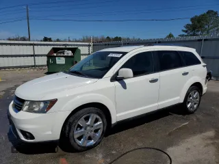 2012 Dodge Journey Crew with VIN 3C4PDCDGXCT146909, listed as a Copart auction lot 49216555 with 161,436 mi miles and Salvage title. Bid and sale history available at DreamBid. Image 1.