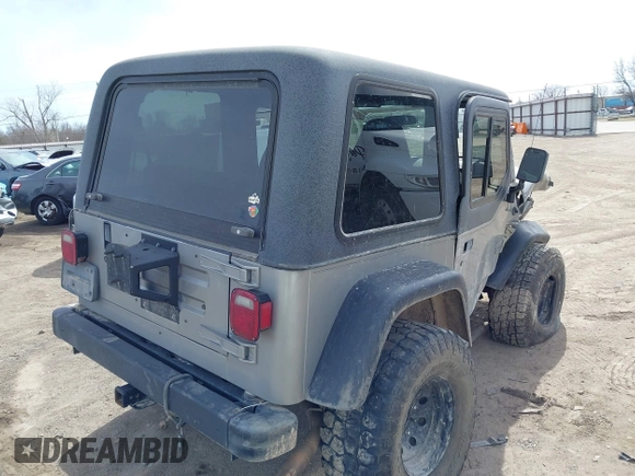 2002 Jeep Wrangler X with VIN 1J4FA39S82P707610, listed as a IAAI auction lot 41709953 with 1 mi miles. Bid and sale history available at carsss.com. Image 4.