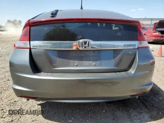 2012 Honda Insight z VIN JHMZE2H34CS003929, wystawiony jako Copart lot #52707885 z przebiegiem 131 596 mil mil oraz Szkoda całkowita • Salvage title. Historia ofert i sprzedaży dostępna na DreamBid. Obrazek 6.