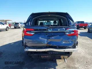 2024 Honda Odyssey EX-L with VIN 5FNRL6H63RB037259, listed as a IAAI auction lot 41665850 with 2,710 mi miles and . Bid and sale history available at DreamBid. Image 17.