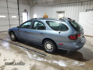 1999 Ford Taurus SE z VIN 1FAFP58S0XG301691, wystawiony jako Copart lot #81920424 z przebiegiem 203 931 mil mil oraz Szkoda całkowita • Salvage title. Historia ofert i sprzedaży dostępna na DreamBid. Obrazek 2.