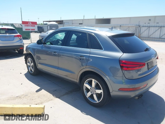 2015 Audi Q3 Prestige with VIN WA1GFCFS7FR013818, listed as a IAAI auction lot 41975076 with 60,295 mi miles and . Bid and sale history available at DreamBid. Image 3.