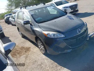 2013 Mazda 5 Sport with VIN JM1CW2BL4D0145725, listed as a IAAI auction lot 42190177 with 143,209 mi miles and . Bid and sale history available at DreamBid. Image 1.