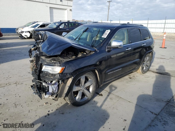 2014 Jeep Grand Cherokee Overland with VIN 1C4RJFCM5EC417335, listed as a Copart auction lot 87300714 with 0 mi miles and Salvage Title. Bid and sale history available at carsss.com. Image 1.