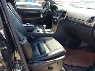 2015 Jeep Grand Cherokee Limited with VIN 1C4RJFBG4FC827251, listed as a IAAI auction lot 41930563 with 94,208 mi miles. Bid and sale history available at carsss.com. Image 5.