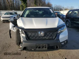 2019 Honda Passport EX-L z VIN 5FNYF8H57KB029404, wystawiony jako Copart lot #86810504 z przebiegiem Nie podano mil oraz Szkoda całkowita • Salvage title. Historia ofert i sprzedaży dostępna na DreamBid. Obrazek 5.
