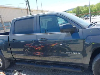 2017 Chevrolet Silverado 1500 LT with VIN 3GCUKREC3HG462501, listed as a IAAI auction lot 42050327 with 183,688 mi miles. Bid and sale history available at carsss.com. Image 13.