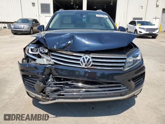 2015 Volkswagen Touareg Lux z VIN WVGEP9BP2FD006802, wystawiony jako Copart lot #52291965 z przebiegiem 122 787 mil mil oraz Szkoda całkowita • Salvage title. Historia ofert i sprzedaży dostępna na DreamBid. Obrazek 5.