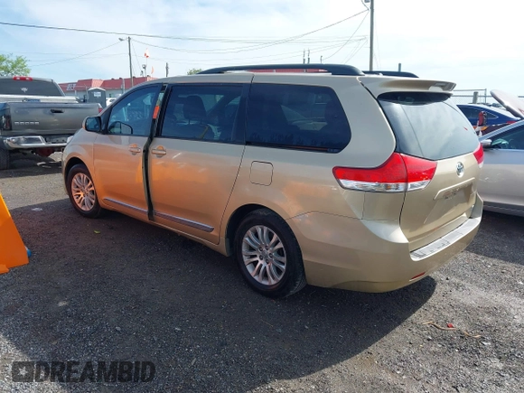 2013 Toyota Sienna XLE AAS with VIN 5TDYK3DC5DS331291, listed as a IAAI auction lot 42090586 with 176,711 mi miles and . Bid and sale history available at carsss.com. Image 3.