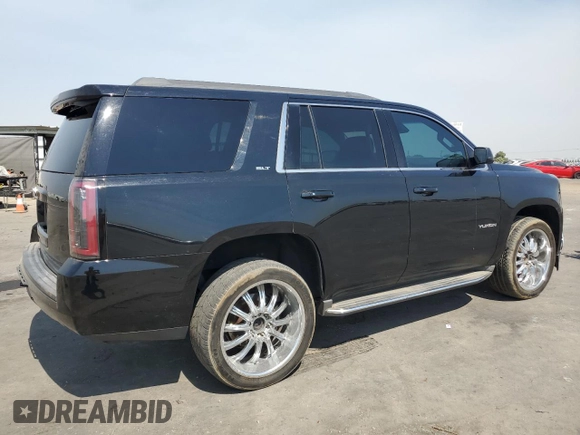 2016 GMC Yukon SLT with VIN 1GKS1BKCXGR122111, listed as a Copart auction lot 69900124 with 73,781 mi miles and Salvage Title. Bid and sale history available at carsss.com. Image 3.