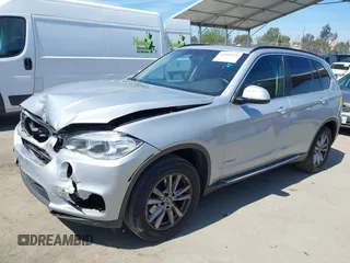 2014 BMW X5 sDrive35i with VIN 5UXKR2C54E0H31217, listed as a IAAI auction lot 41881021 with 163,492 mi miles. Bid and sale history available at carsss.com. Image 2.