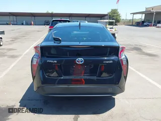 2016 Toyota Prius Four z VIN JTDKARFU7G3017018, wystawiony jako IAAI lot #42224376 z przebiegiem 74 136 mil mil oraz . Historia ofert i sprzedaży dostępna na DreamBid. Obrazek 17.