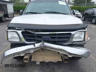 2000 Ford F-150 XL with VIN 1FTRX17L4YNA39407, listed as a IAAI auction lot 42141350 with 82,824 mi miles and . Bid and sale history available at DreamBid. Image 6.