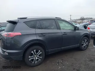 2018 Toyota RAV4 LE with VIN JTMBFREV0JJ223957, listed as a IAAI auction lot 41652810 with 144,629 mi miles. Bid and sale history available at carsss.com. Image 13.